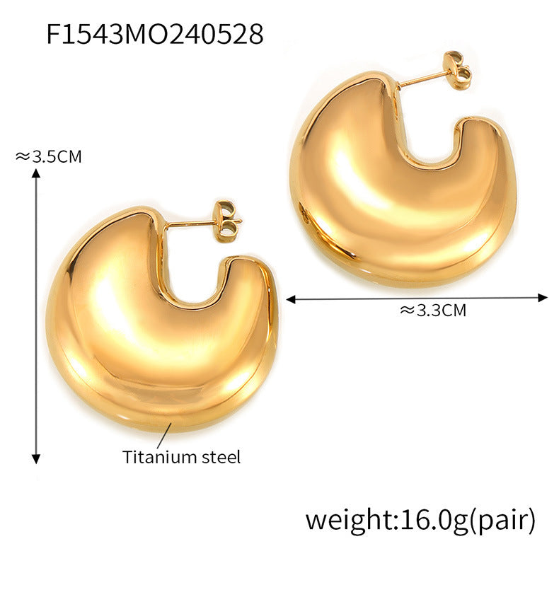 European and American fashion gold geometric C- shaped earrings titanium steel plated 18K gold simple design hollow bright three-dimensional earrings