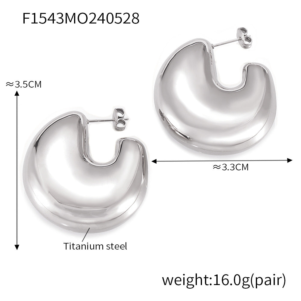 European and American fashion gold geometric C- shaped earrings titanium steel plated 18K gold simple design hollow bright three-dimensional earrings