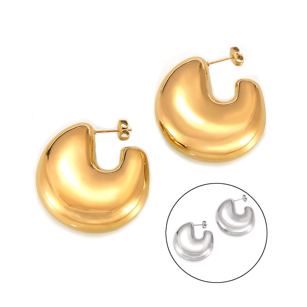 European and American fashion gold geometric C- shaped earrings titanium steel plated 18K gold simple design hollow bright three-dimensional earrings
